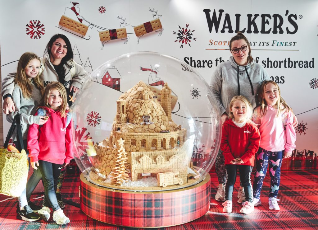 Creative Fall Shortbreaddisplay Walker’s Shortbread displays snow globe activation at Edinburgh Airport