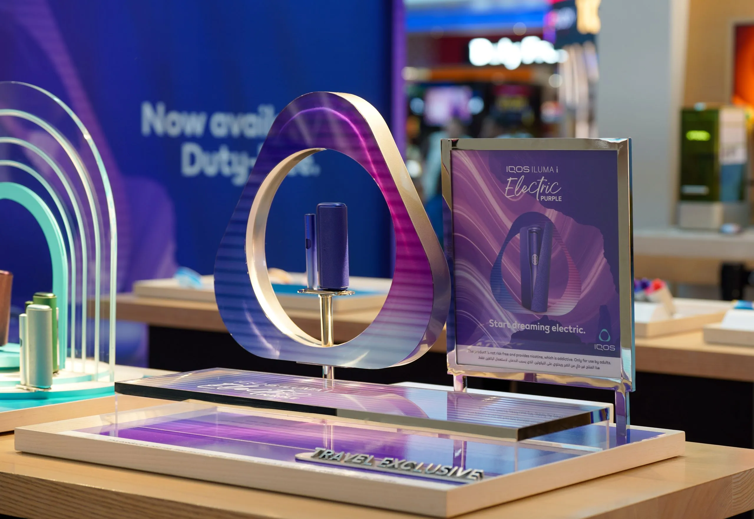 PMI GTR introduces Electric Purple IQOS ILUMA i to travel retail